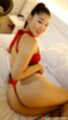 Lying on her side showing her ass looking over her shoulder