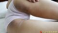 Tuyet in white panties hand on thigh