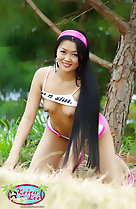 On all fours long hair in ribbon over her shoulder top pulled up over her bare small tits