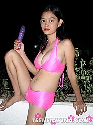 Alma Chua Holding Toy Pink Bikini