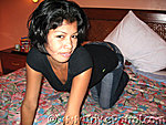 Kneeling On Bed
