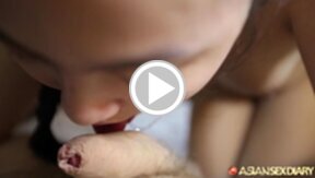 Quyen on her knees nude licking and sucking cock