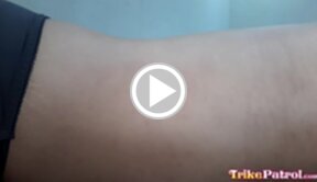 Krisha topless in denim shorts kneeling on bed sucking cock